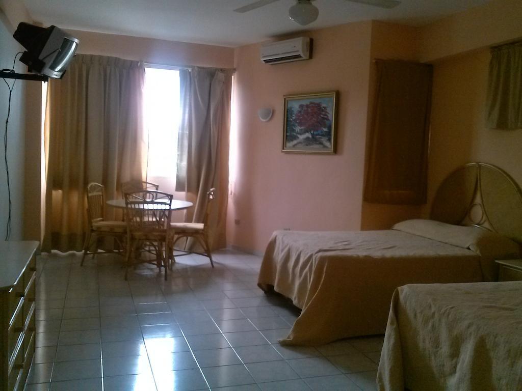 Apartahotel Jardines Metropolitanos Сантьяго-де-лос-Трейнта-Кабальєрос Екстер'єр фото