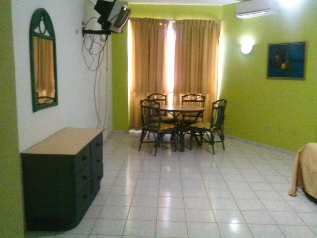 Apartahotel Jardines Metropolitanos Сантьяго-де-лос-Трейнта-Кабальєрос Номер фото